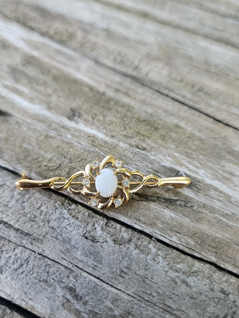 Gold-Tone Opal and Crystal Flower Bar Brooch - White Opal Accent
